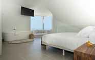 Bedroom 2 Higueron Hotel Malaga, Curio Collection by Hilton