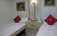 Bilik Tidur 4 Lily Garden Guest House