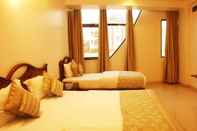 Bedroom Hotel Shipra International