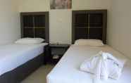 Bilik Tidur 3 Rimondi Grand Resort & Spa