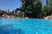 Swimming Pool Green Peace Hotel