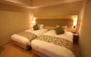 Kamar Tidur 7 Moon Ocean Ginowan Hotel & Residence