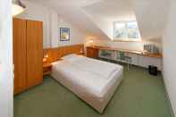ห้องนอน Hotel Altenburgblick