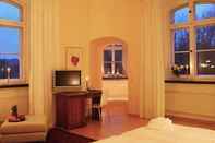 ห้องนอน Hotel Schloss Spyker