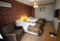 卧室 6 Flower Palace Hotel