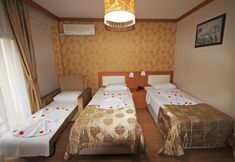 卧室 4 Flower Palace Hotel