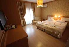 卧室 2 Flower Palace Hotel