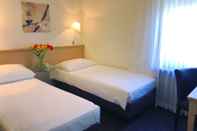 ห้องนอน Hotel Neufeld