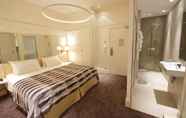 Bedroom 2 Le Cesar Hotel