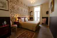 ห้องนอน Les Chambres au Coeur de Bordeaux