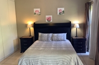 Bedroom Cozy Guestrooms in Midrand