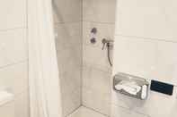 Phòng tắm bên trong Hotel Main Taunus