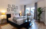 Bilik Tidur 4 Stylisches Apartment mit Balkon