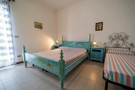 Phòng ngủ Appartamenti Via Roma Campo Mare