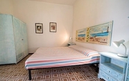 Bedroom 7 Appartamenti Via Roma Campo Mare