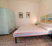 Bedroom 7 Appartamenti Via Roma Campo Mare