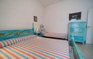 Bedroom 5 Appartamenti Via Roma Campo Mare