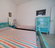 Bedroom 5 Appartamenti Via Roma Campo Mare