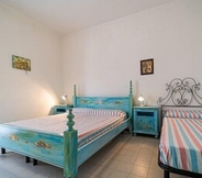 Bedroom 4 Appartamenti Via Roma Campo Mare