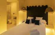 Bedroom 2 Om Hotels