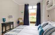 Bedroom 5 Gorgeous 3-bed Garden Flat Beside Battersea Park