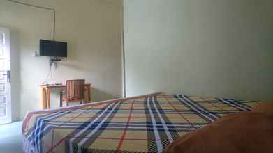 Bedroom 4 Purnama Raya Guest House