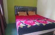 Kamar Tidur 2 Purnama Raya Guest House