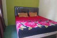 Bedroom Purnama Raya Guest House