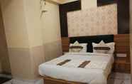 Bedroom 2 Hotel New Pathik