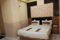 Bedroom Hotel New Pathik