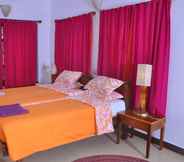 Bedroom 7 Inn Pondiville Forest Retreat