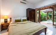 Bedroom 2 SMV- 2BedGRDN - V4 · 2BR Garden Villa Walk to shops and Beach Legian