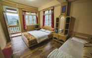 Kamar Tidur 3 OurGuest Bichu Homestay