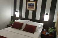 ห้องนอน Hotel Buganvilia