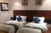 Bedroom Lujain Al Gharbyah Furnished Units