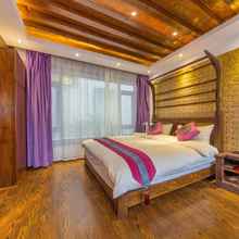 Bedroom 4 Lijiang Happy Yufu Inn