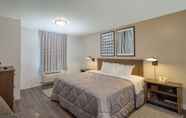 Bedroom 6 InTown Suites Extended Stay Select Charlotte NC - University