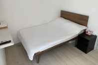 Kamar Tidur City Oasis Guesthouse