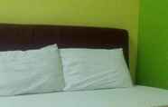 Kamar Tidur 2 Q Hotel