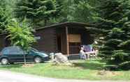 Exterior 6 Tidy Furnished Wooden Chalet near Forest