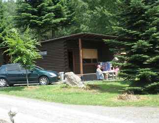 Exterior 2 Tidy Furnished Wooden Chalet near Forest