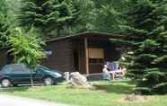 Exterior 3 Tidy Furnished Wooden Chalet near Forest