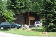 Exterior Tidy Furnished Wooden Chalet near Forest