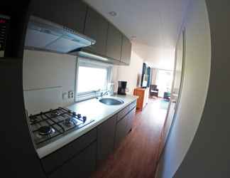 ห้องนอน 2 Detached Chalet With a Dishwasher at 21 km. From Leeuwarden