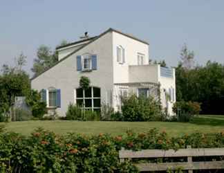 Exterior 2 Detached Villa With Dishwasher and Fireplace on Texel