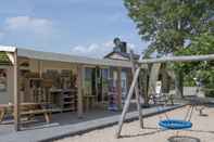 Common Space Colorful Chalet With Terrace Almost at the Lake and Beach