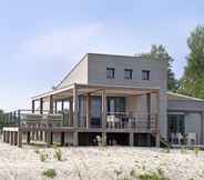 Exterior 6 Luxurious Villa With a Nice Deck, in Nature Reserve De Punt