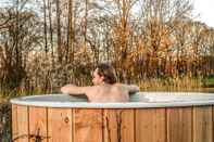 Entertainment Facility Fine Chalet Near the Water With a Woodfired hot tub