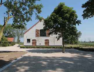 Exterior 2 Elegant Farmhouse in Zuidzande With Private Garden