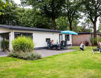 Exterior 2 Comfortable Chalet With Dishwasher, Within De Veluwe